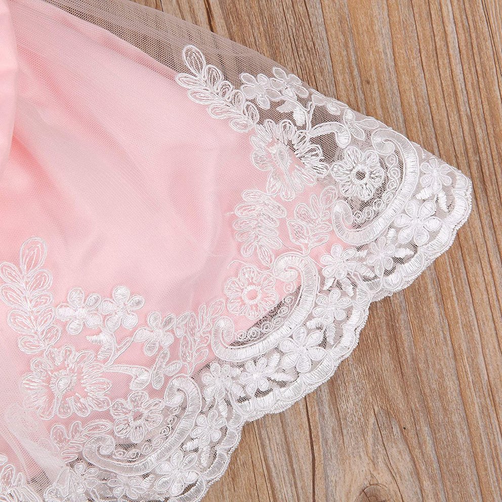 Taufkleider Mädchen: Auffälliges Taufkleid mit Schleife in rosa-weiß